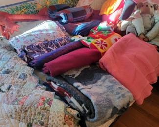 quilts, blankets, full sized bed (back bedroom)