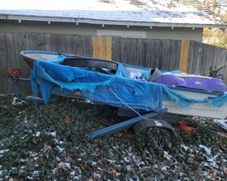 old boat, no title, comes with trailer (needs work)