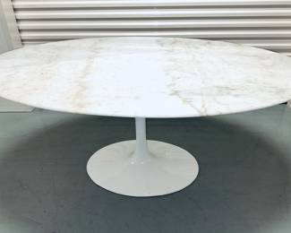 Outstanding oval tulip table on heavy metal base a la Saarinen 