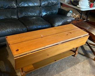 #68 pine drop side coffee table 50x18-34x21 $100.00