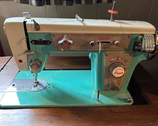#90 Capri Teal Color Heavy Duty Sewing Machine in Cabinet $75.00