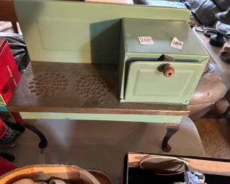 #122 Tin toy stove oven 14 x 6 x 11" $20.00