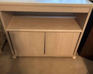 #134 Blonde laminate microwave cart, on wheels, two drawers 29x15x26 $20.00