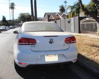 2012 Volkswagen EOS 2.0 TSI  
Mechanic special - 99,895 mi 
Left head light needs bulb
Washer fluid needs hose