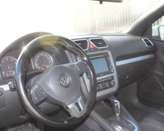 2012 Volkswagen EOS 2.0 TSI  
Mechanic special - 99,895 mi 
Left head light needs bulb
Washer fluid needs hose