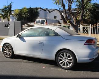 2012 Volkswagen EOS 2.0 TSI  
Mechanic special - 99,895 mi 
Left head light needs bulb
Washer fluid needs hose