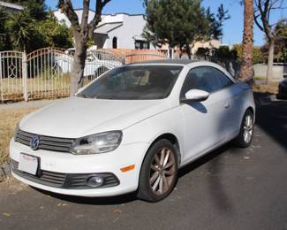 2012 Volkswagen EOS 2.0 TSI  
Mechanic special - 99,895 mi 
Left head light needs bulb
Washer fluid needs hose
