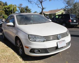 2012 Volkswagen EOS 2.0 TSI  
Mechanic special - 99,895 mi 
Left head light needs bulb
Washer fluid needs hose