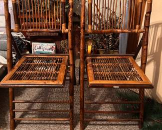 A pair of 1970s rattan bamboo dining room chairs in superb condition!