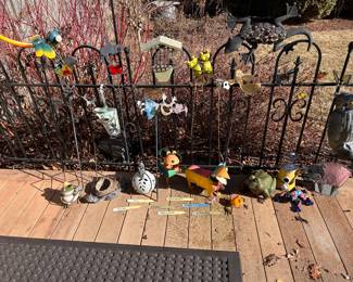We have frogs and butterflies, owls and dragonflies, dogs and other critters for your lawn and yard! In the foreground is the outdoor container that they all were kenneled or hibernating in!