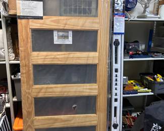 A ‘five lite’ panel barn door and on the right shows the sliding rail system hardware to hang the barn door. NEW never used!!