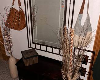 More Pier 1 Homestyle Decor, Including a wall mirror, Coffee Table And a couple of ladies purses.