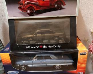 Diecast and wood cars with their "garages". TAKEALOOK at the one on the bottom, this is a Willy 1:18th scale 1963 Chevy Impala SS HT diecast, blue MONT IN BOX!!  never opened!! wow pretty cool!!