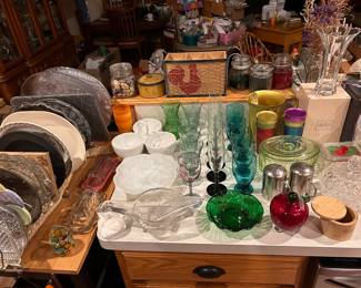 Various kitchen glassware, plates, platters and vases.