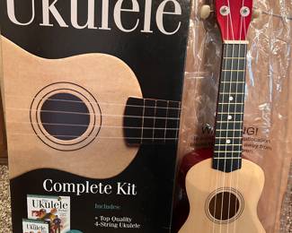 NIB—This is a NEW - 'PLAY Today Ukulele' that has never been played. I just opened it now and removed the plastic bag to show the Ukulele.