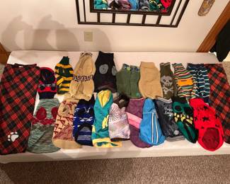 Dog clothes & A couple of dog blankets on the right. Not shown is a whole lot of brand new dog accessories - leashes, brushes, dog dishes…