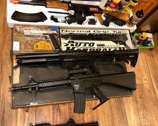 A GREAT assortment of Air Soft toy weapons. Including the battery powered KALASHNIOV AK47, Elite Force 1911 TAC, the DPMS Panther Carbine, the Combat Machine 6mm Semi/Auto  & the Auto Hardball ll Super Shotgun.