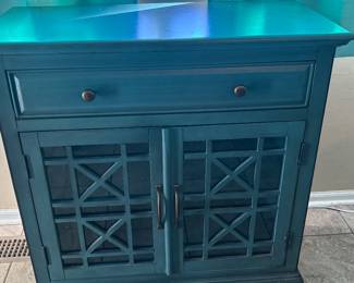 Teal accent cabinet