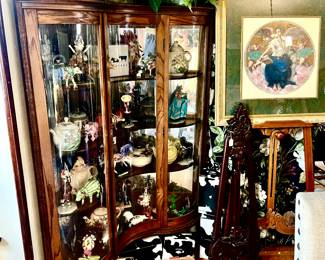 CURVED GLASS CURIO CABINET.  UNUSUAL.