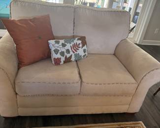 Micro fiber love seat with matching large high backed sofa