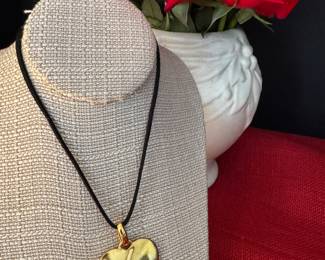 1. Yves St Laurent Heart Gold Tone $248