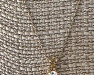 #115 - $295- 0.31 ctw diamond pendant with 18" yellow gold chain 14kt. 