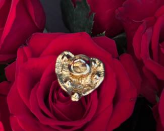 14. Vintage Yves St. Laurent ANZA heart $190