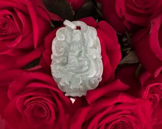 #165 -$328 - Jade pendant carved on both sides. Appraised by Bere. Appraisal will convey to buyer. Approx 1 1/2 x 3' 