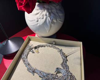 #62 - $48 - large rhinestone bird necklace 