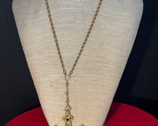 #160 - One of a kind!!!! Custom made "Jeweled Cross of Burges" 18kt yellow gold (approx 1987) mesuring 3.25" H x 2.38"W, 55.72 grams , jeweled with 4 square emeralds, 4 square sapphires & 2 rubies. Reversible cross. Hang on an 18kt gold loose rope chain, 20" long + 2.5" chain between cross and chain. chain weight 19.36 grams. $4,750. Appraisal included. 