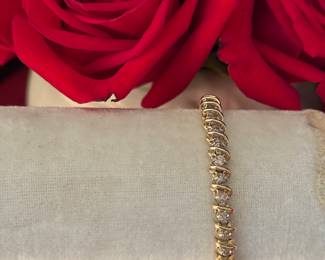 #123 - 7" tennis bracelet - 4 ctw of diamonds on 14kt yellow gold setting. 18.7 gr. $1550 