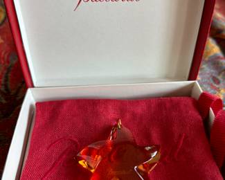 #144 - $130 - Baccarat Pendant Starfish orange glass in original box. 