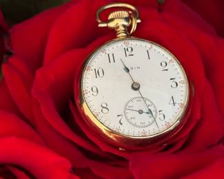 #38 - $150 - Elgin woman gold filled pocket watch - was running 