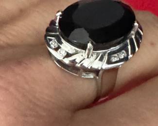 #158 - $950 - 14kt white gold custom made ring with 6 round diamonds and large 14.24 approx black onyx stone. Ring gold weight 14.60 grams. includes appraisal by Bere. 