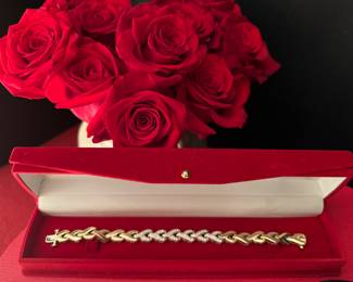 15.  1.5 ctw 14k 22.48 grams Gold & Diamond Bracelet $1400