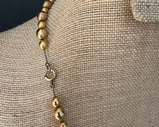 #82 - $600 - beaded gold necklace 14kt gold, 15.42 gr 23". 