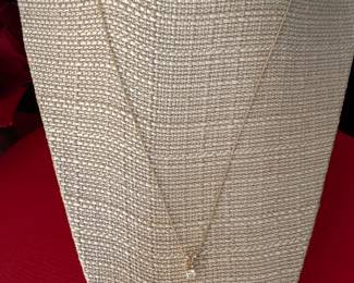 #115 - $295- 0.31 ctw diamond pendant with 18" yellow gold chain 14kt. 