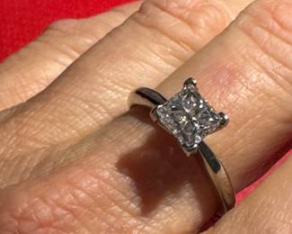 126- 1.54 diamond - princess cut on 14kt white gold setting . Size 7 1/4 - Size 8-  $2,200 