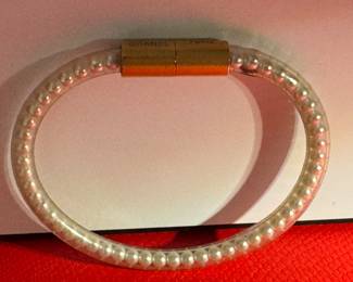 8. $240 - Chanel bracelet lucite beaded 8 1/2" 