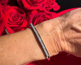 16. 10kt Black & White Diamonds 9.8 grams $450