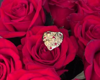 14. Vintage Yves St. Laurent ANZA heart $190