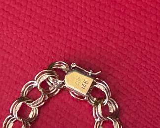 #110- $1,000 - hearts charm bracelet 14kt yellow gold 7" chain - 16.4 gr. 