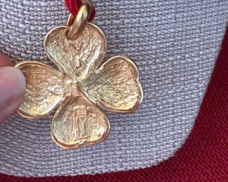 2. Vintage Yves St. Laurent trefle pendant, adjustable $340
