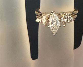 #106- $1500 - 1 ctw ring (0.53 ct marquise) 14kt yellow gold 4 grams.Size 5.