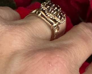 #30 - $240 - 14kt gold w/garnets - size 6. 
