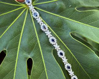 #146 - Wonderful 14kt white gold lady's bracelet with a concealed clasp. bracelet features nine (9) natural blue sapphire. 7 1/4" long. see appraisal for details carats. Price upon request.  