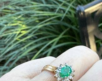 #150 - $500 - Emerald & diamond ring on 14kt yellow gold setting. 2.7 grams. Size 7 