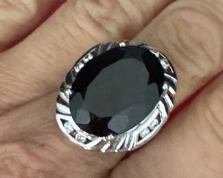 #158 - $950 - 14kt white gold custom made ring with 6 round diamonds and large 14.24 approx black onyx stone. Ring gold weight 14.60 grams. includes appraisal by Bere. 