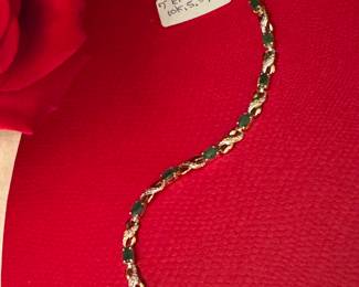 #29 - $350 -10kt yellow gold & Emerald bracelet 7" long. 5.3 grams 