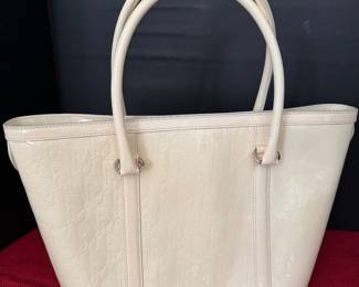 #44 - Lady Dior cream patent purse cannage $1,050
